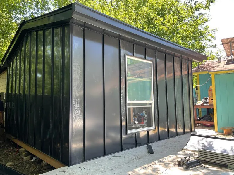 Black standing seam metal wall panels for Metal Roof Installation in East Granby