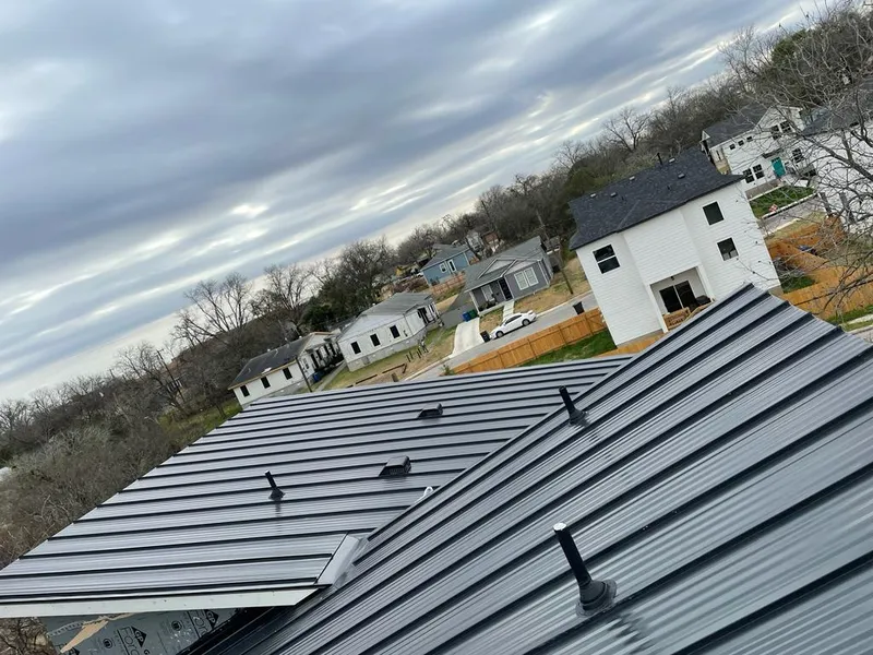 Standing seam metal roof panels with vents for Skylight Repair in East Granby